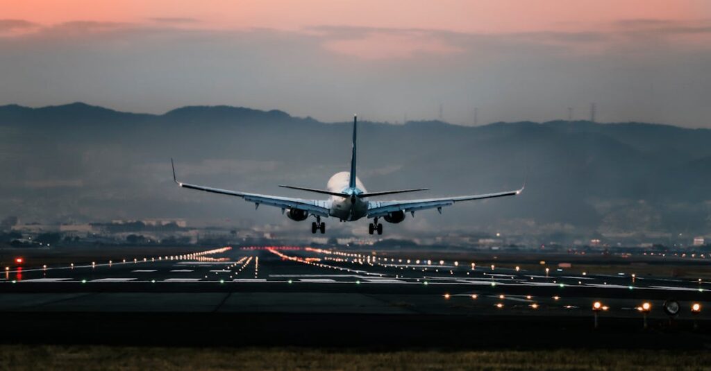 A Deep Dive into Car and Driver Customer Service: Navigating Excellence 8 Dramatic view of a commercial airplane landing on a runway at sunset with mountains in the background.