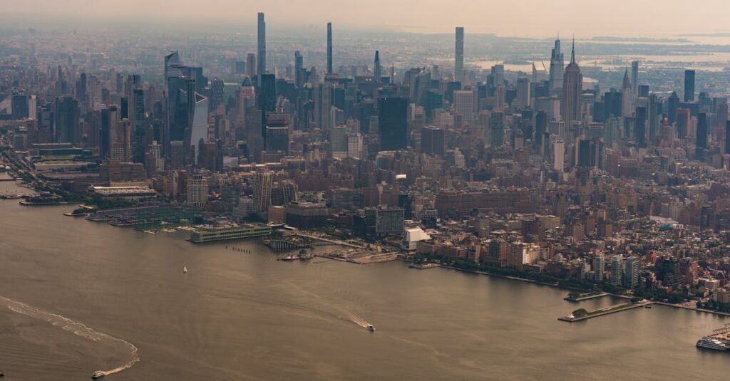 A stunning aerial view of New York City's iconic skyline and river.
