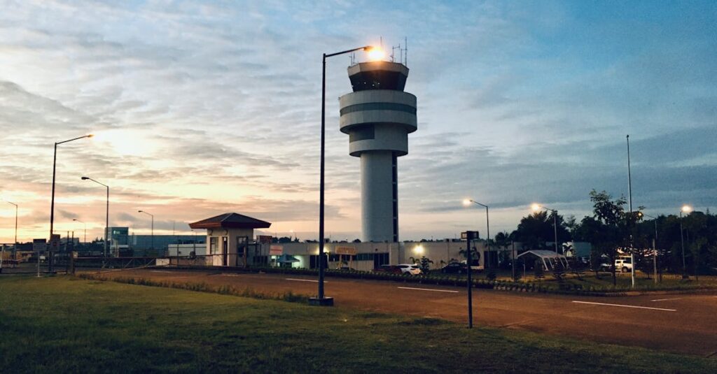 View of the control tower in Davao City, Philippines, during sunset with a serene sky.