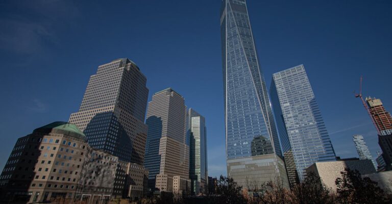 Stunning view of New York City's Lower Manhattan skyline featuring One World Trade Center.