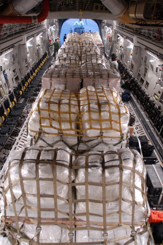 JetBlack Freight 12 aircraft, plane, cargo, hold, bundles, crates, packages, body, military, lights, brown plane, brown body, brown airplane, aircraft, cargo, cargo, cargo, cargo, cargo, crates, crates, crates, packages